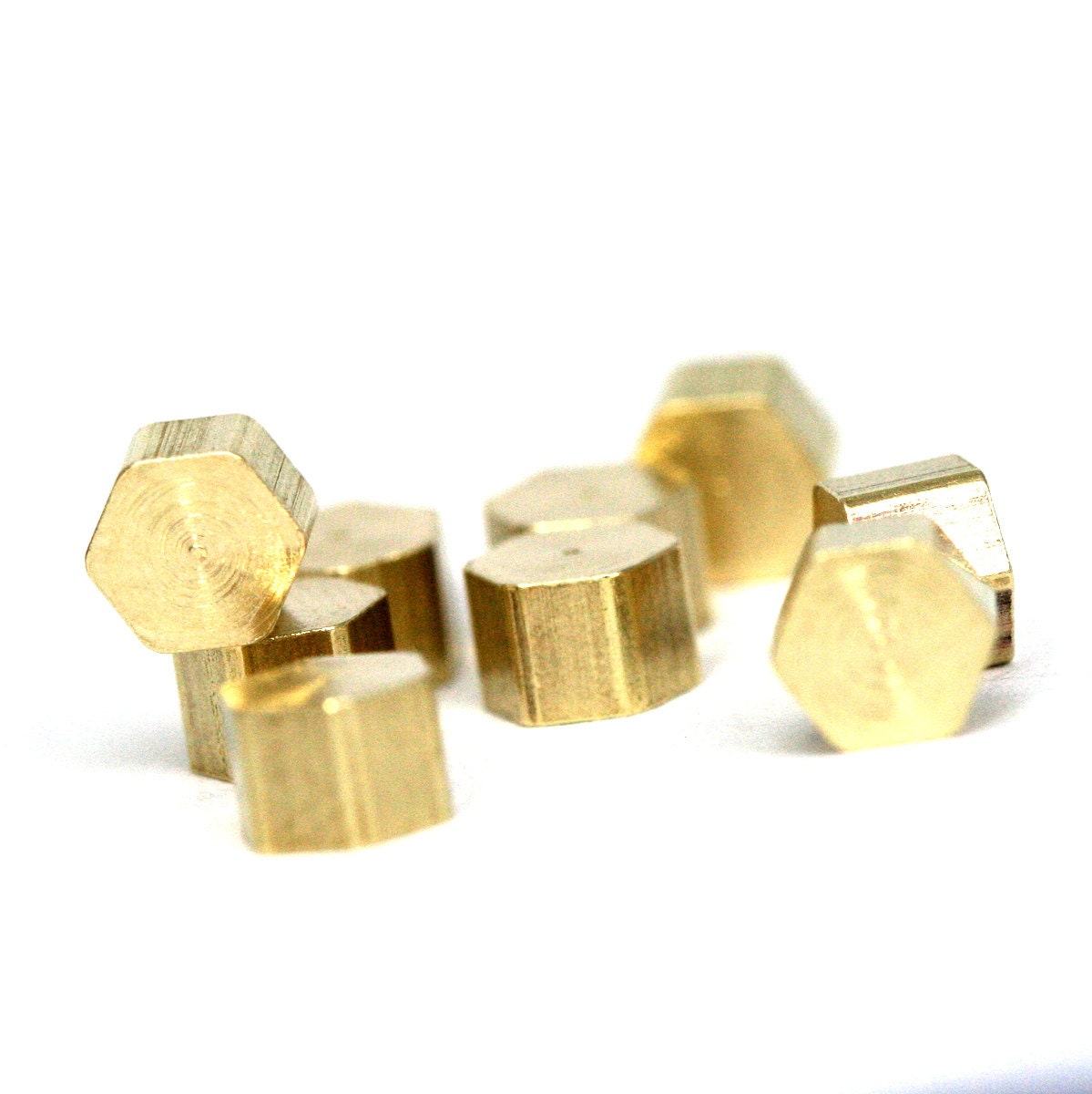 Raw Brass hexagonal 4x3mm 1/4"x1/8" 1297R