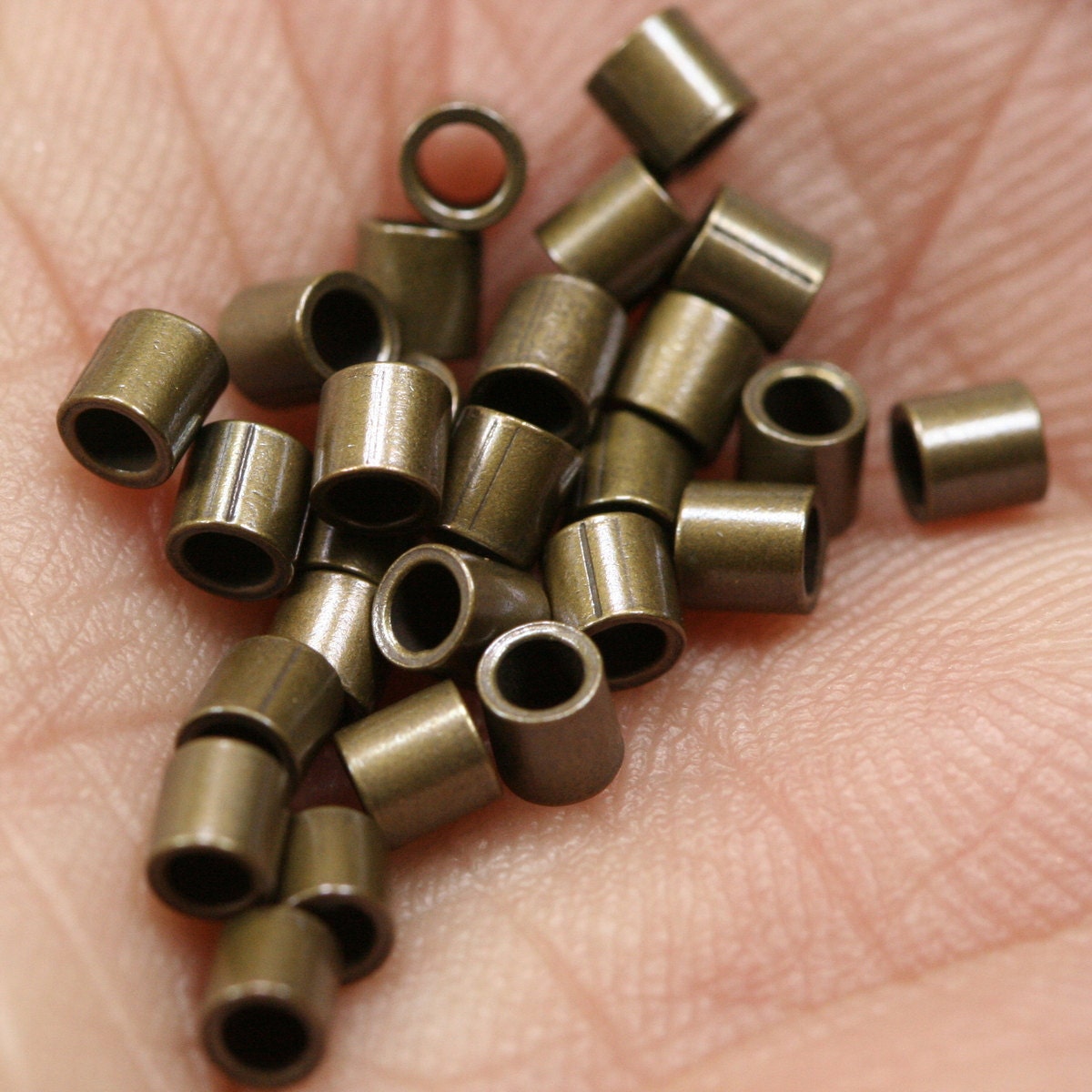 Crimp tubes, crimp beads pcs 2.5x2.5mm 1,75mm 14 gauge inside diameter. Antique Brass 1401Y-15 crmb