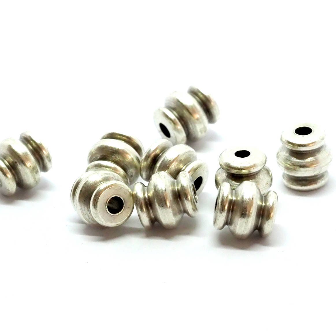 silver plated brass cylinder, spacer bead 7x7mm (hole 2mm) bab2 1519S