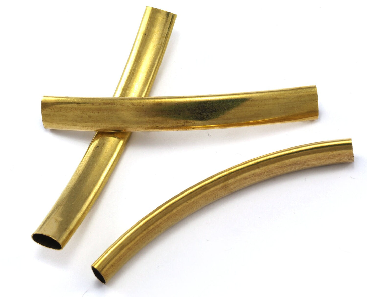 curved oval tube raw brass 60x3.5x7.5mm (hole 3x7mm) bab 2249