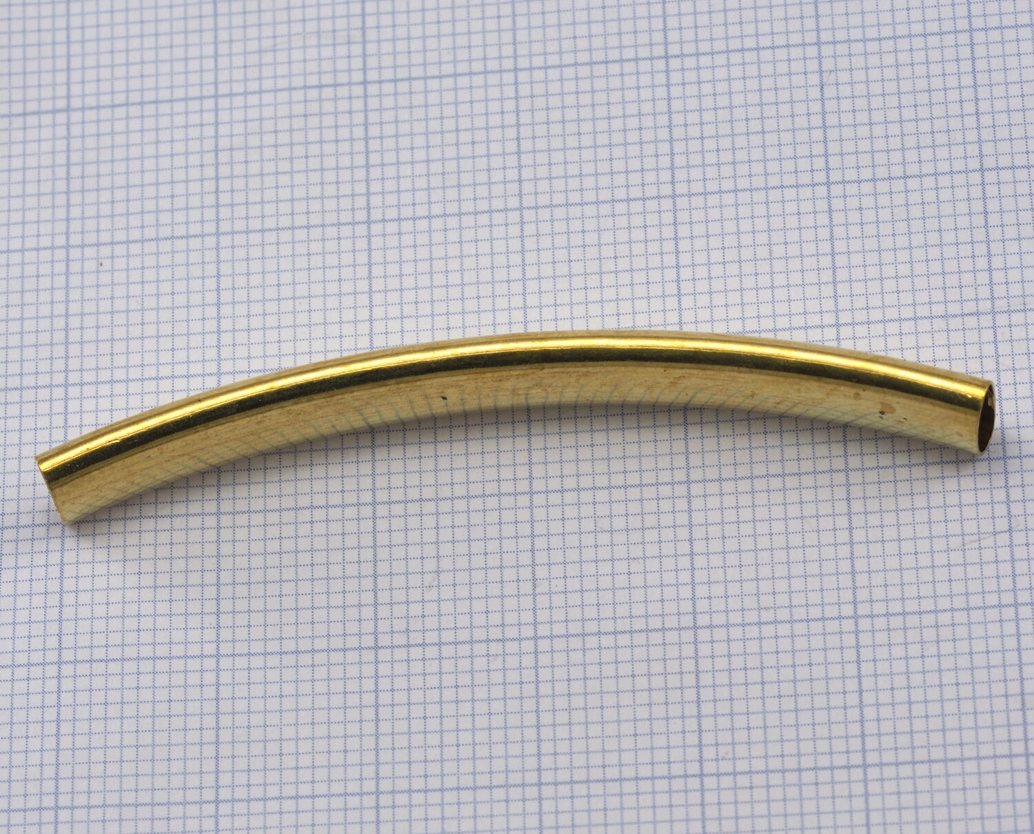 curved oval tube raw brass 60x3.5x7.5mm (hole 3x7mm) bab 2249