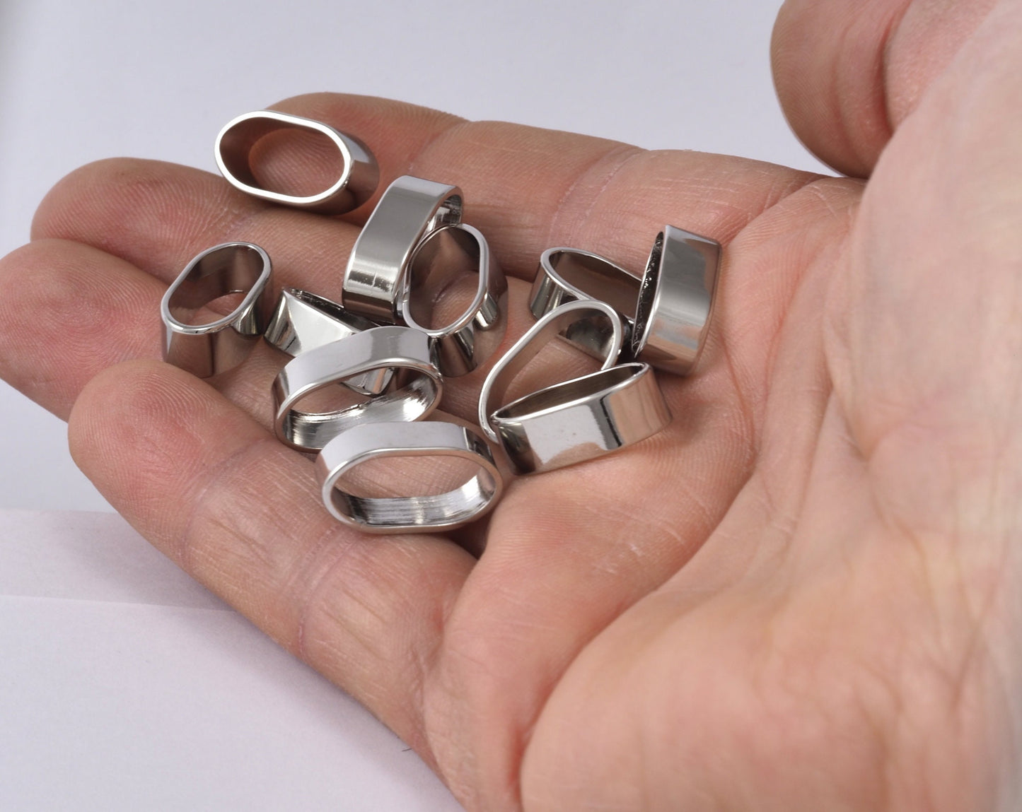leather, ribbon ,cord ,slider , 18x9x6mm Rhodium plated brass spacer hole 16x7mm bab 2324