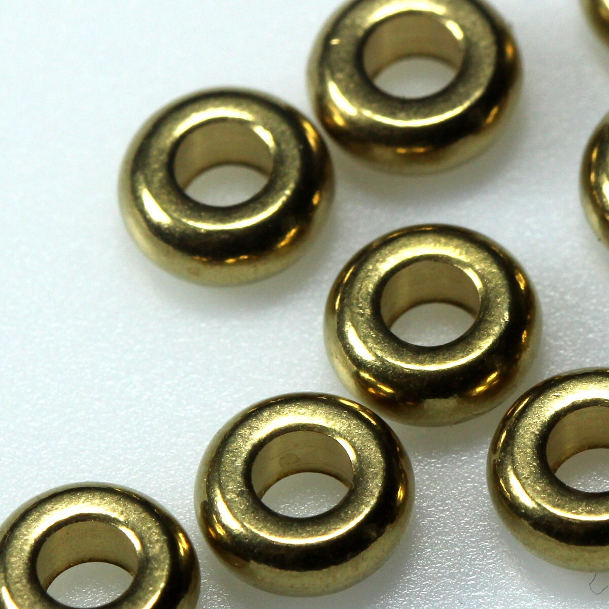 15 pcs 7mm 9/32" (hole 4,2mm 11/64") raw solid brass spacer bead donut shape, Findings bab4.2-9 1185