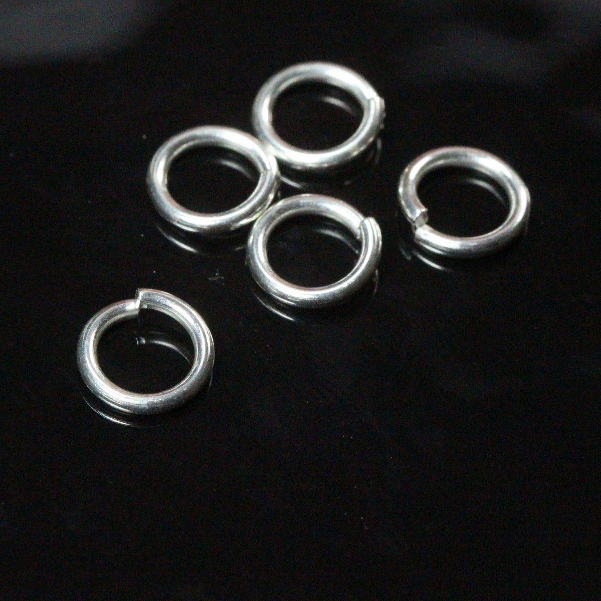 Open jump ring 3mm 23 gauge( 0,6mm ) silver plated brass 1152-S