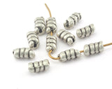 Silver plated Swirl Alloy spacer beads 10x5mm (hole 1mm) Findings bab1 3450-67