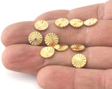 Starburst design tag 8 mm (1mm thickness) gold plated brass 4128