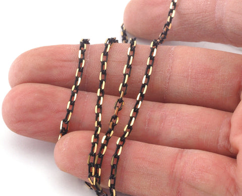 Brass soldered chain 2,5x4mm Gold tone and black z181